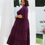 Model wearing plus size dress with pockets - Harlow Dress in Berry by Peach The Label