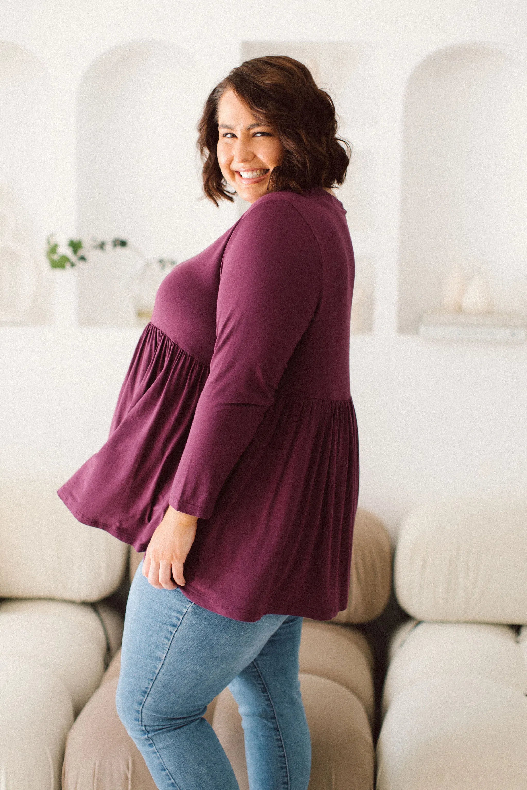 Plus Size clothing,  women modeling a Plus size womens shirt, Lucy Long Sleeve Top in Purple berry