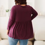 Plus Size clothing,  women modeling a Curvy Womens shirt, Lucy Long Sleeve Top in Purple berry